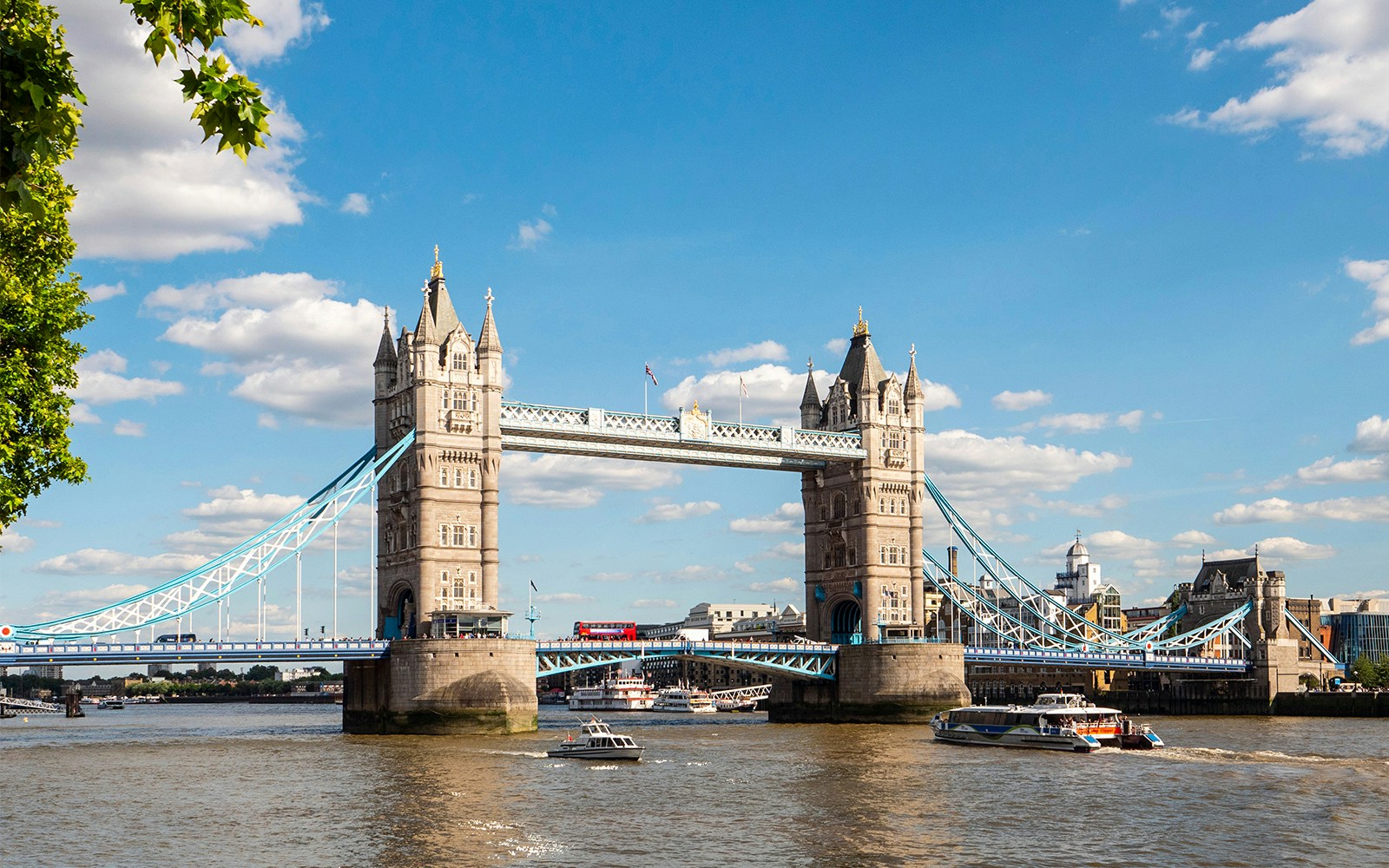 Tower Bridge in London viewed from a sightseeing cruise on the River Thames.