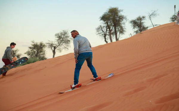 Ras Al Khaimah: Bedouin Desert Camp Experience with BBQ Dinner, Live Shows, Camel Ride, and Shared Transfers