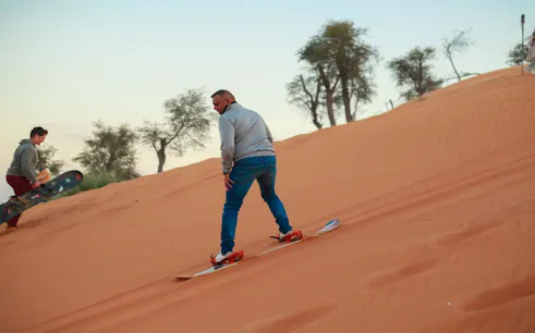 ras al khaimah: bedouin desert camp experience with bbq dinner, live shows, camel ride, and shared transfers-1