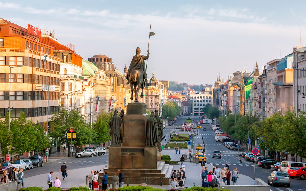 Wenceslas Square view with statue near Prague National Museum.