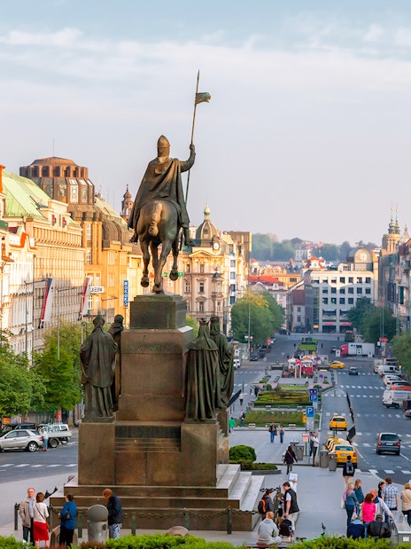 Wenceslas Square view with statue near Prague National Museum.