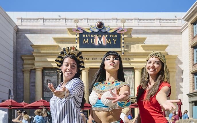 Visitors in Egyptian costumes at Revenge of the Mummy attraction, Universal Studios Orlando.