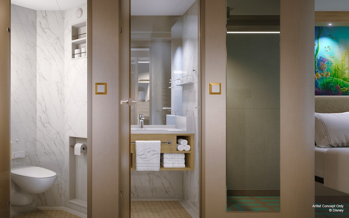 Stateroom bathroom with marble accents on Disney Adventure Cruise from Singapore.