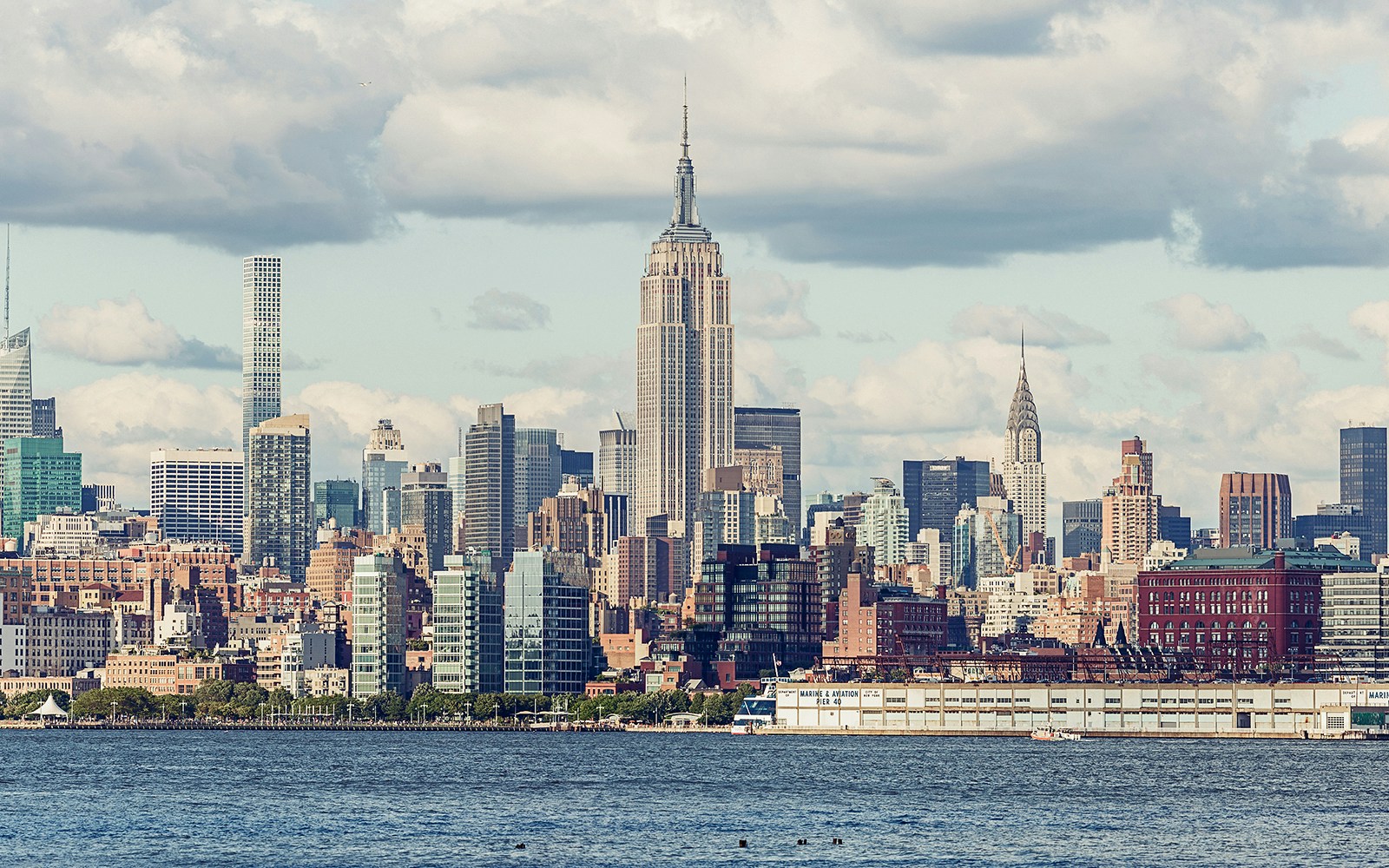 Empire State Building view from Jersey City during a sightseeing cruise.