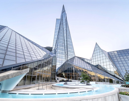 Caldea spa exterior with mountain backdrop in Andorra, highlighting Caldea Classic Entry Tickets.