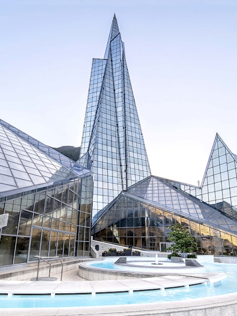 Caldea spa exterior with mountain backdrop in Andorra, highlighting Caldea Classic Entry Tickets.
