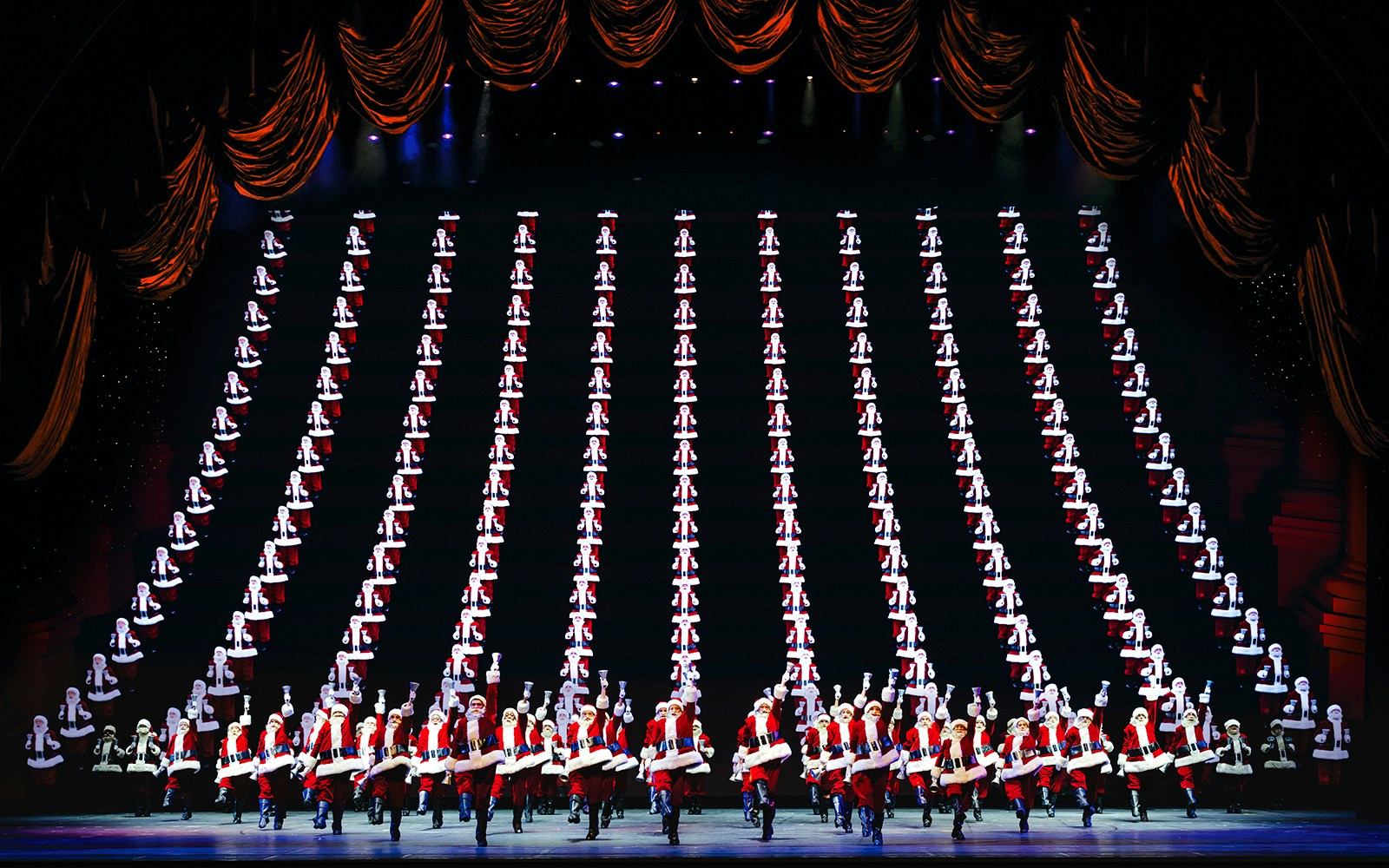 Radio City Rockettes performing in Christmas Spectacular with synchronized dance routine.