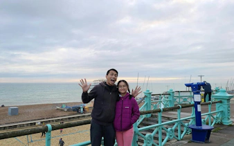 People enjoying the Brighton seafront, part of the Brighton Highlights Lost Letter self-guided city exploration game.