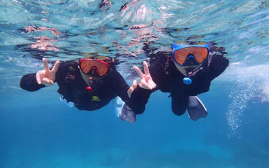 Snorkelers underwater at Phantom Island, Ishigaki, Okinawa.