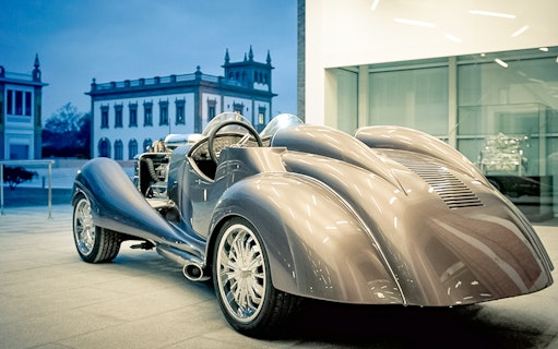 Vintage car exhibit at Malaga Automobile & Fashion Museum.