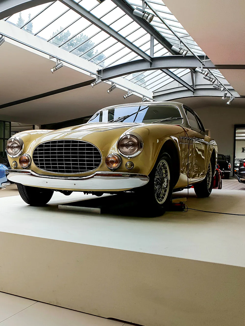 Classic car display at Lamborghini Museum, Italy.