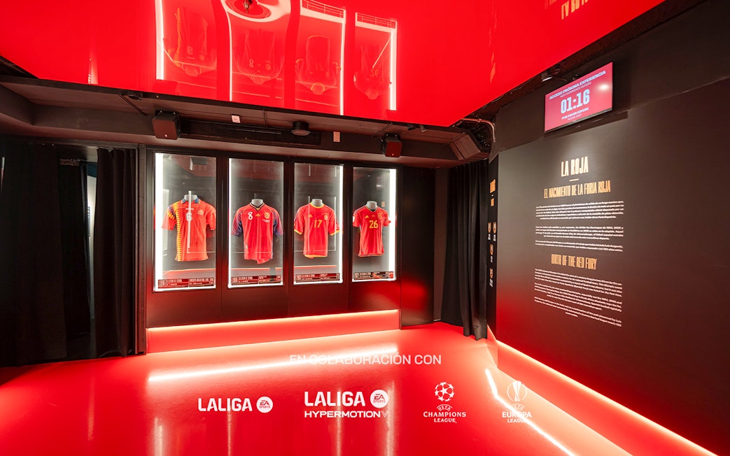 Football jerseys display at Legends of Football Museum, featuring La Liga and Champions League logos.