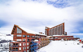Valle Nevado ski resort buildings in snowy Andes, Santiago tour.
