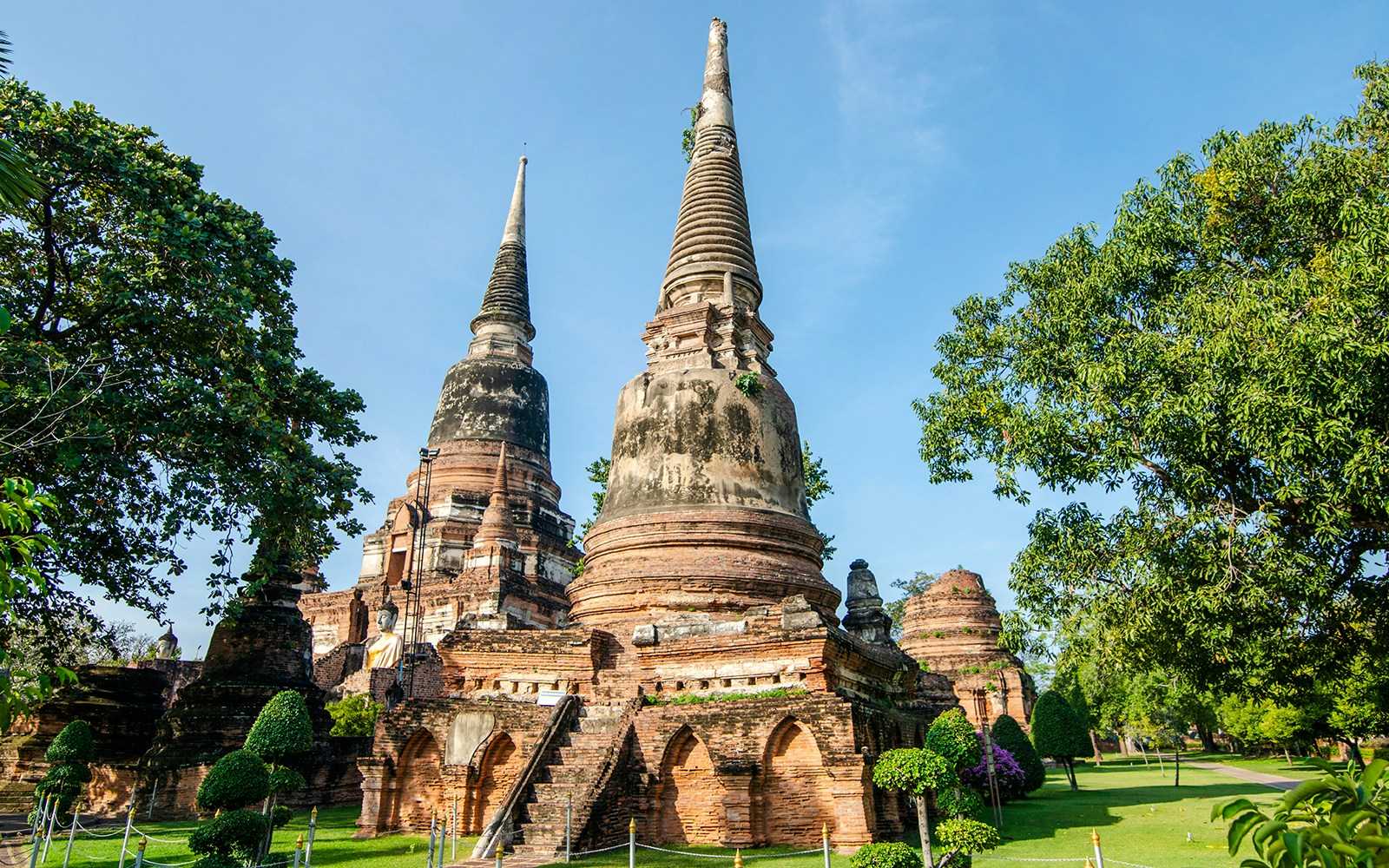 Buddha statues and ancient pagoda at Wat Yai Chai Mongkhon, Ayutthaya, Thailand.