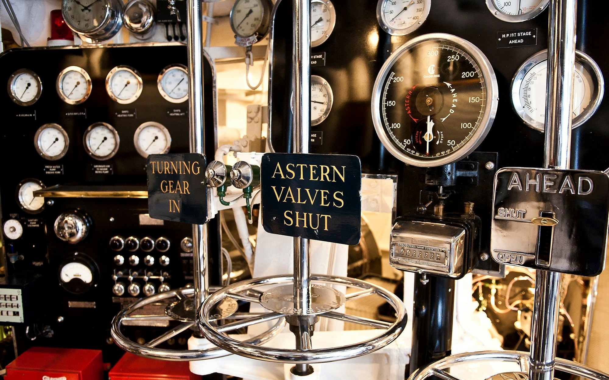 Royal Yacht Britannia engine room with control gauges and valves.