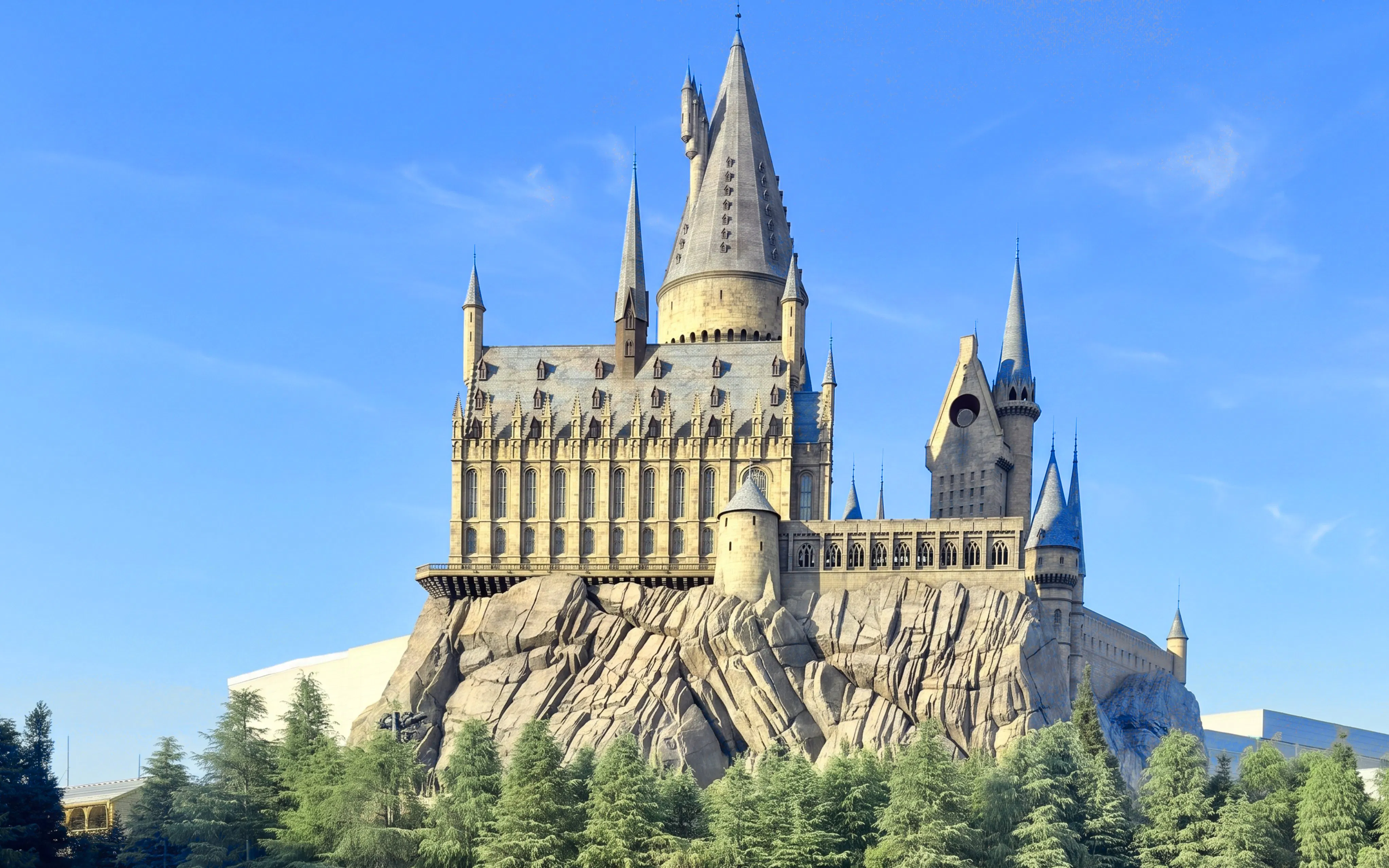 Hogwarts Castle at Universal Studios Japan with blue sky backdrop.