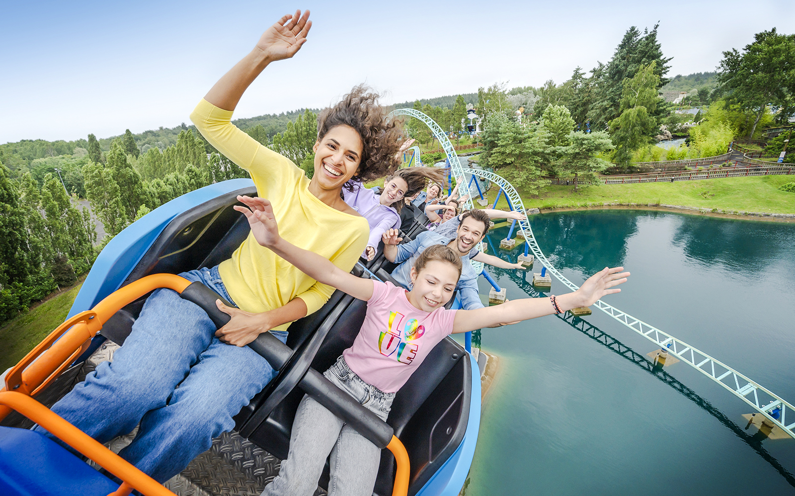 Visitors enjoying a roller coaster ride at Parc Asterix, France.