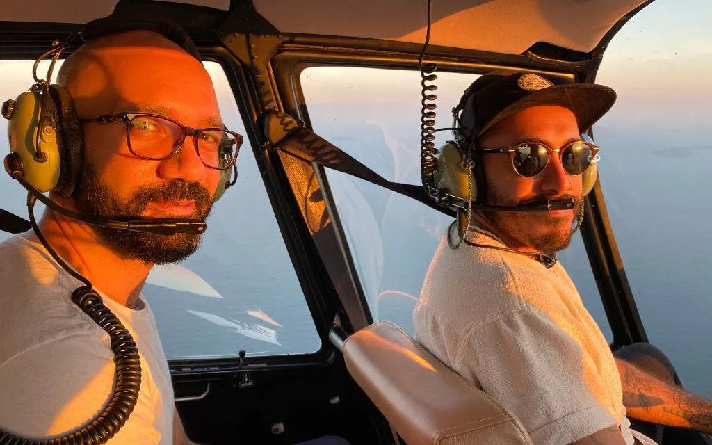 Tourists enjoying a helicopter tour over Rio de Janeiro.