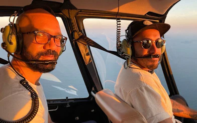 Tourists enjoying a helicopter tour over Rio de Janeiro.