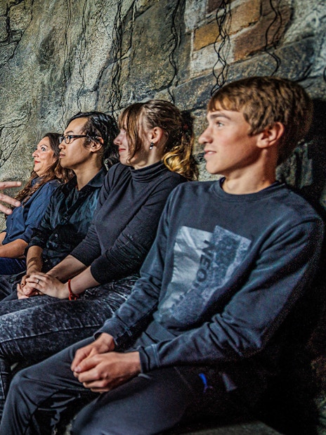 Performer interacting with visitors at Berlin Dungeon.
