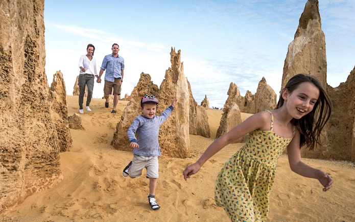 Family exploring Pinnacles Desert on a guided tour from Perth.