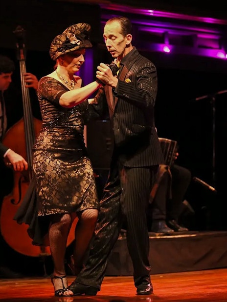 Tango dancers performing at El Querandí Tango Show in Buenos Aires.