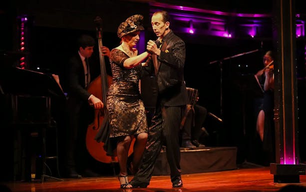 Tango dancers performing at El Querandí Tango Show in Buenos Aires.