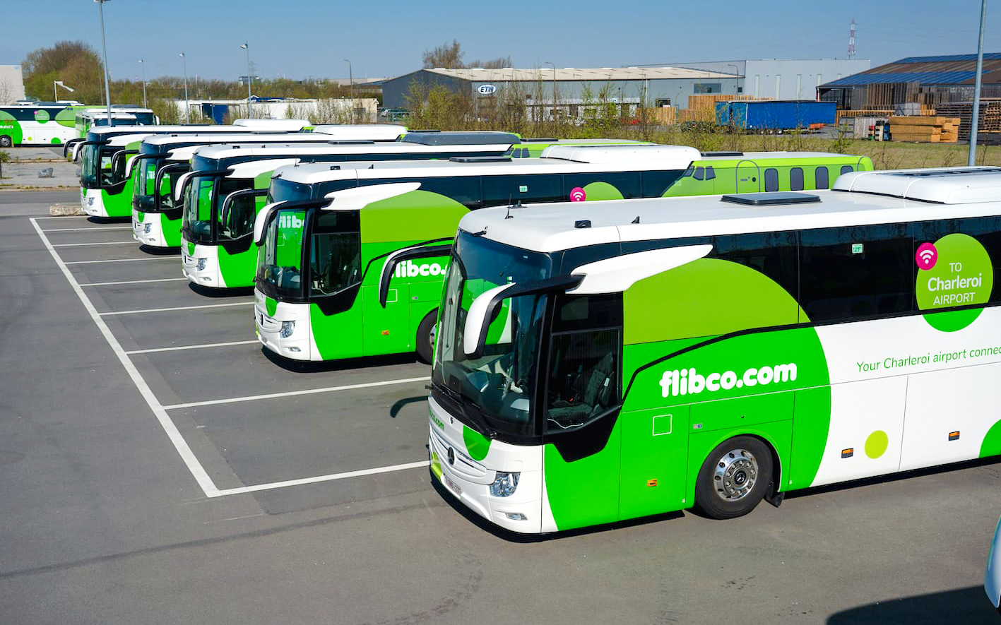 Buses parked in a lot at Charleroi Airport, Belgium.