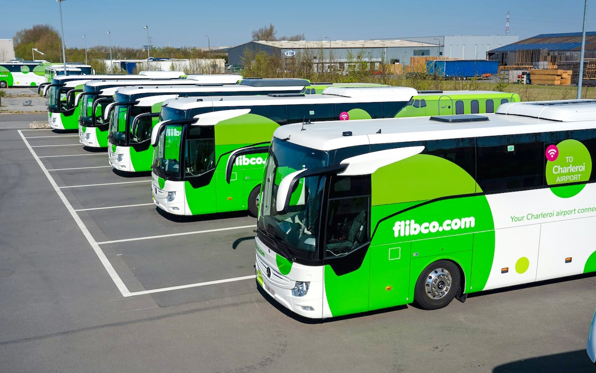 Buses parked in a lot at Charleroi Airport, Belgium.