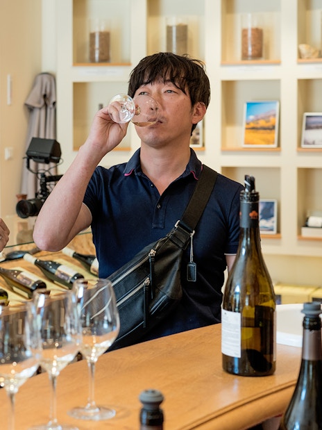 Visitors tasting wine at a winery in Bandol and Cassis.