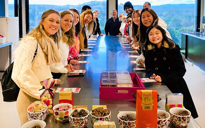 Guests sampling chocolates at Yarra Valley Guided Gourmet Tour.