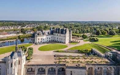 Amboise Royal Castle with gardens and river view in France.