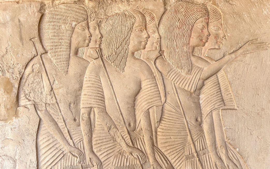 Wall reliefs depicting figures in Horemheb tomb, Saqqara, Giza.