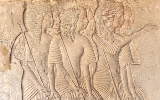 Wall reliefs depicting figures in Horemheb tomb, Saqqara, Giza.