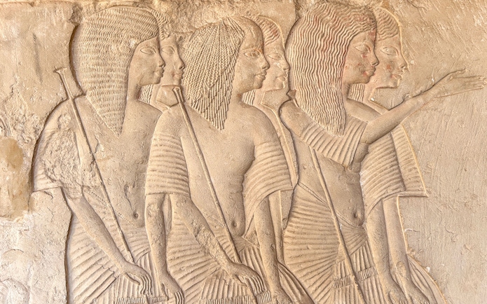 Wall reliefs depicting figures in Horemheb tomb, Saqqara, Giza.