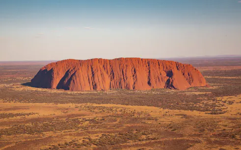 Uluru aerial view during 15-minute scenic helicopter flight in Australia.