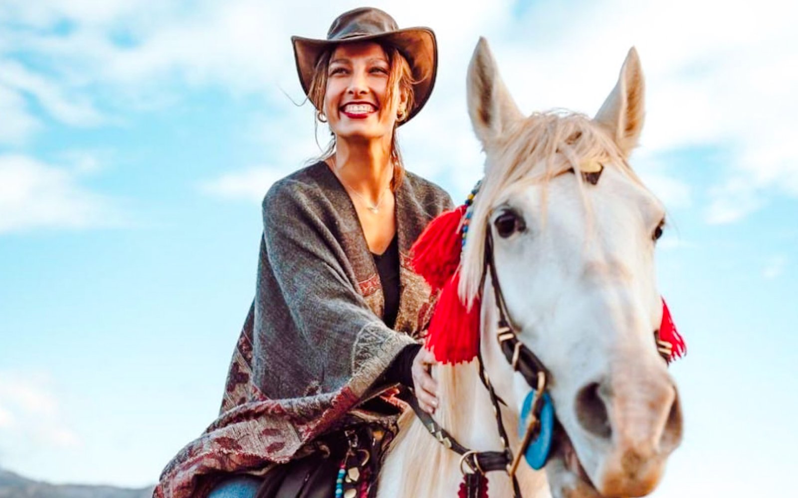 Guest riding a horse during sunrise tour in Cappadocia.