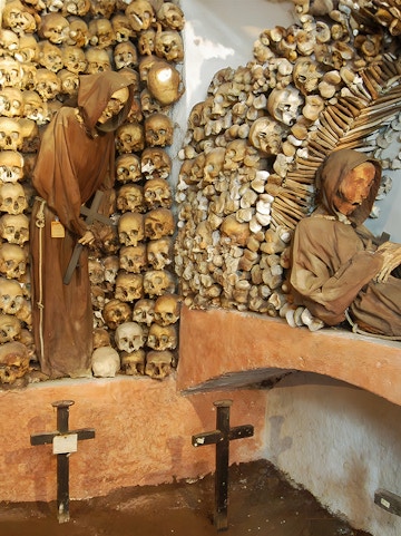 Monk skeletons and skulls in Rome's Capuchin Crypt, Italy.