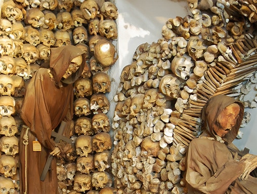 Monk skeletons and skulls in Rome's Capuchin Crypt, Italy.