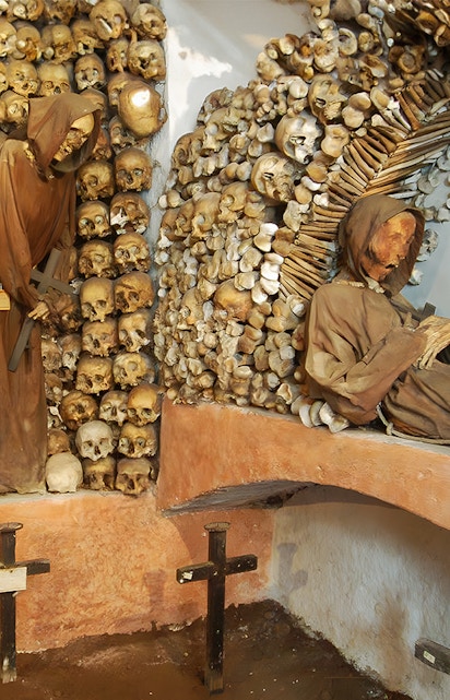 Monk skeletons and skulls in Rome's Capuchin Crypt, Italy.