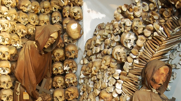 Monk skeletons and skulls in Rome's Capuchin Crypt, Italy.