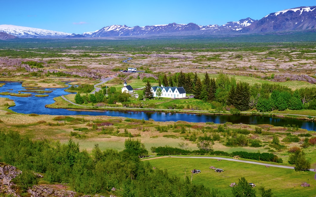 Thingvellir National Park landscape with river and distant mountains, Reykjavik Golden Circle tour.