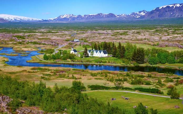Thingvellir National Park landscape with river and distant mountains, Reykjavik Golden Circle tour.