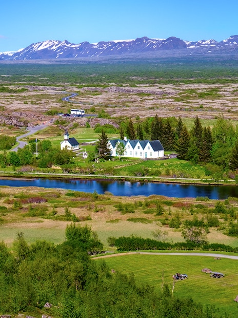 Thingvellir National Park landscape with river and distant mountains, Reykjavik Golden Circle tour.