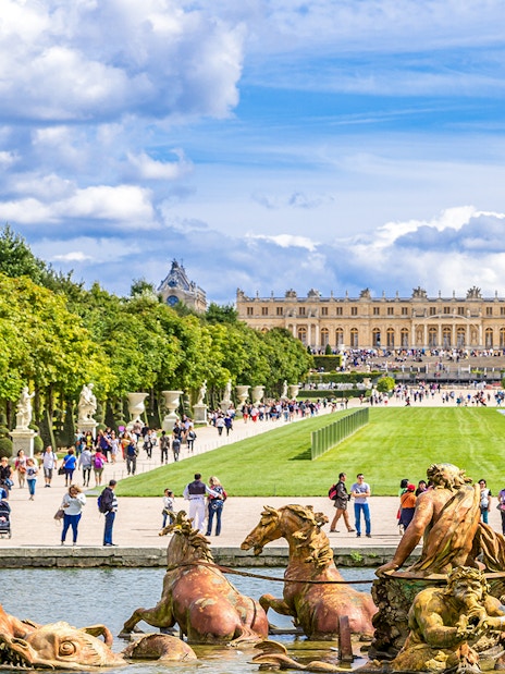 Fountain and gardens leading to the Palace of Versailles, France.