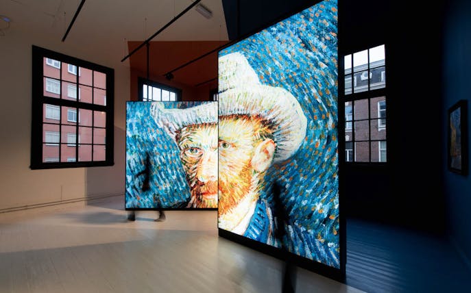Van Gogh digital art display in Amsterdam gallery.