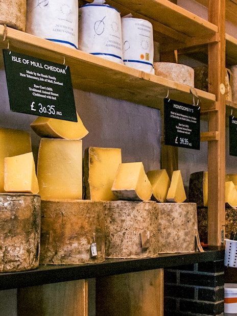 Cheese selection at Borough Market stall during Eating London: Borough Market & Bankside Food Tour.