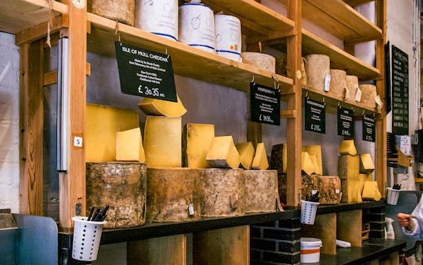 Cheese selection at Borough Market stall during Eating London: Borough Market & Bankside Food Tour.