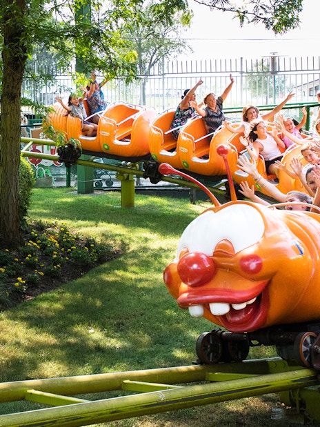 Children enjoying a caterpillar ride at Gardaland Park.