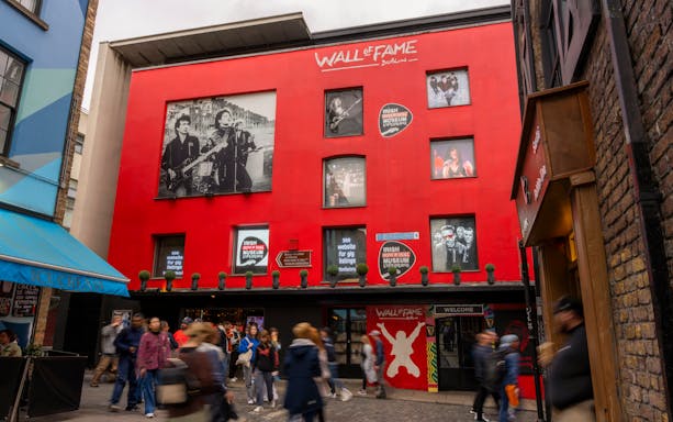 Irish Rock N Roll Museum Experience entrance with Wall of Fame in Dublin.